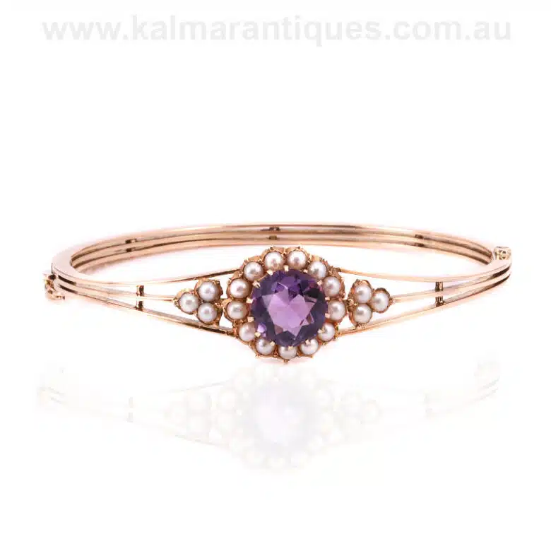 Antique hinged bangle set with an amethyst and pearls