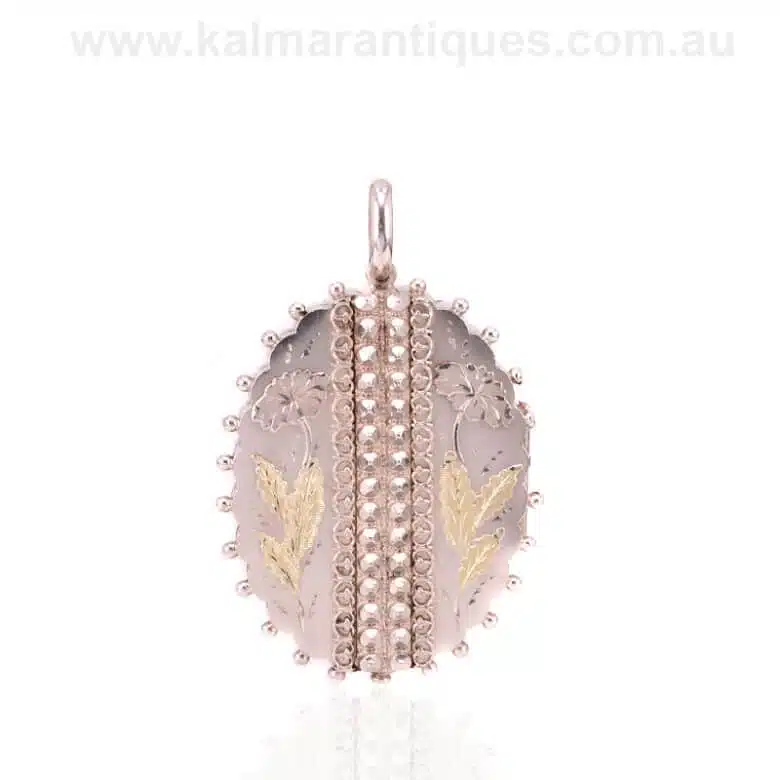 Victorian era antique locket in sterling silver and green gold