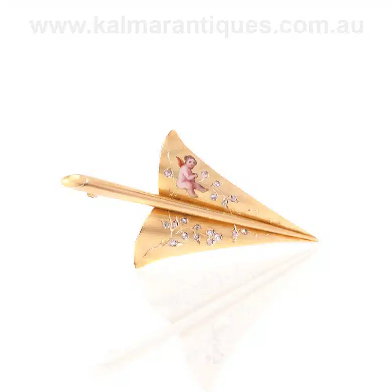 Antique arrow brooch set with diamonds and Cupid