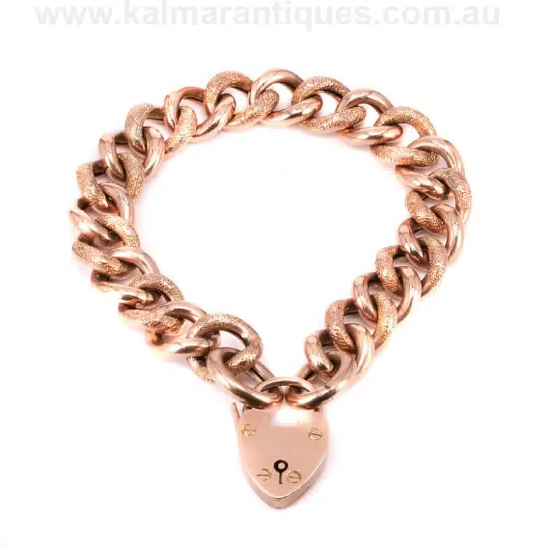 Antique 9 carat rose gold curb link night and day padlock bracelet