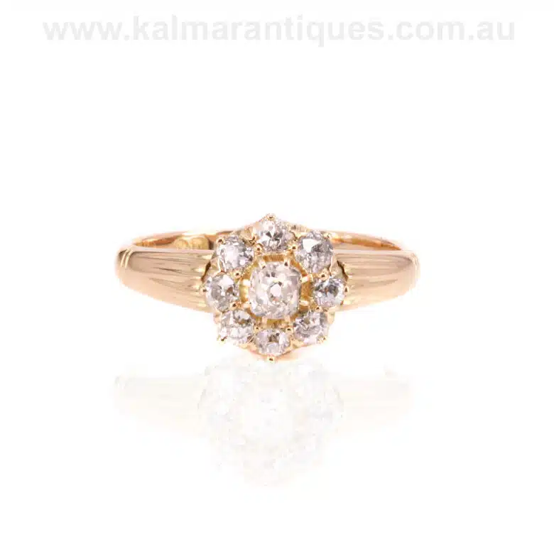 Antique diamond engagement ring set with mine cut diamonds