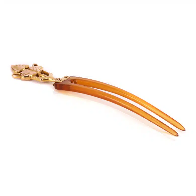 Art Nouveau era horn hair pin set with a 9 carat rose gold top