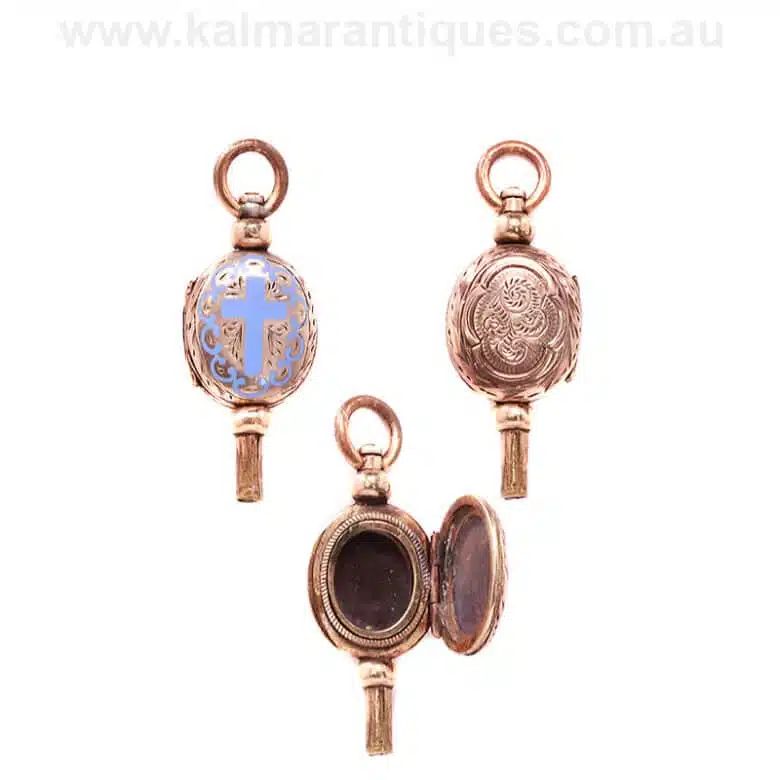 Antique pocket watch key charm/pendant with a cross and secret locket