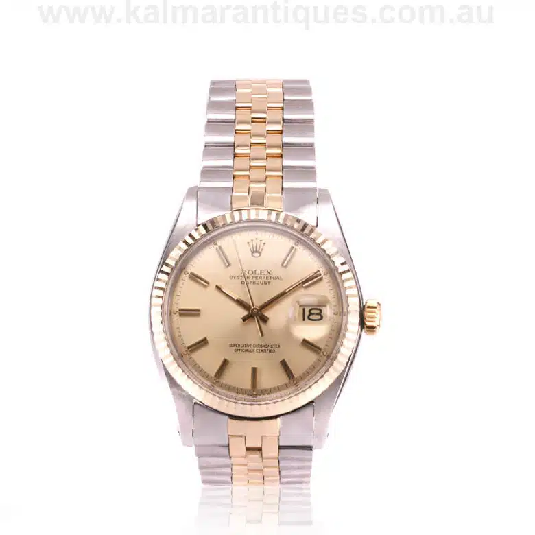 gold and steel Rolex 1601