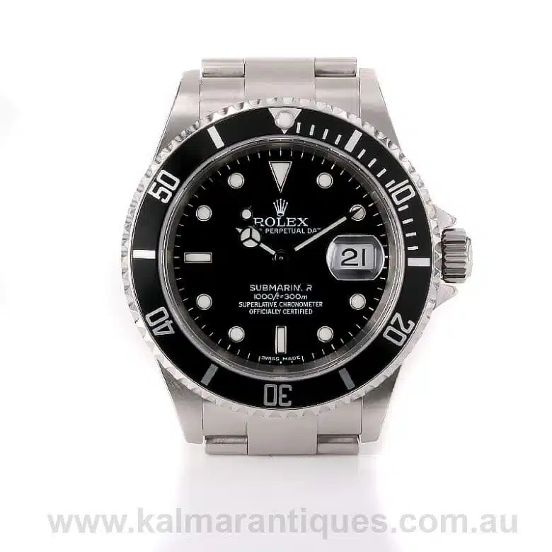 Rolex Submariner 16610 with box and papers.
