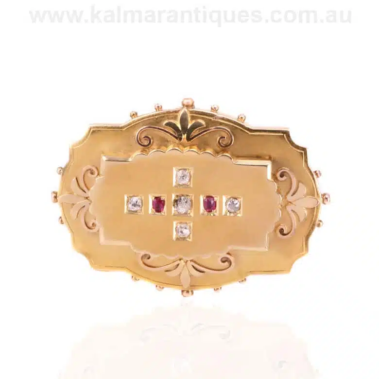 Antique ruby and diamond brooch locket made in the 1870's