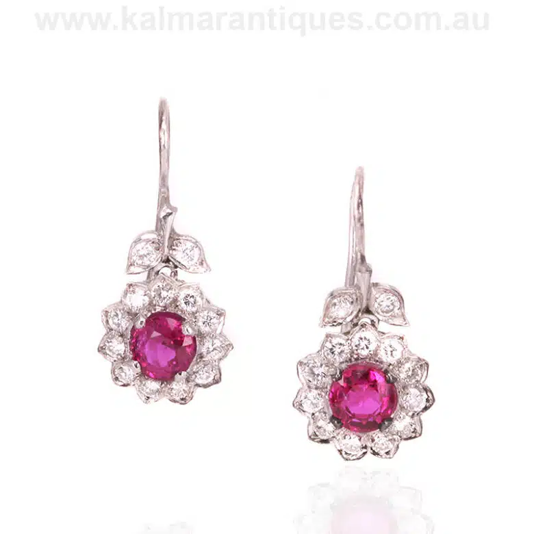 Exquisite platinum ruby and diamond cluster drop earrings
