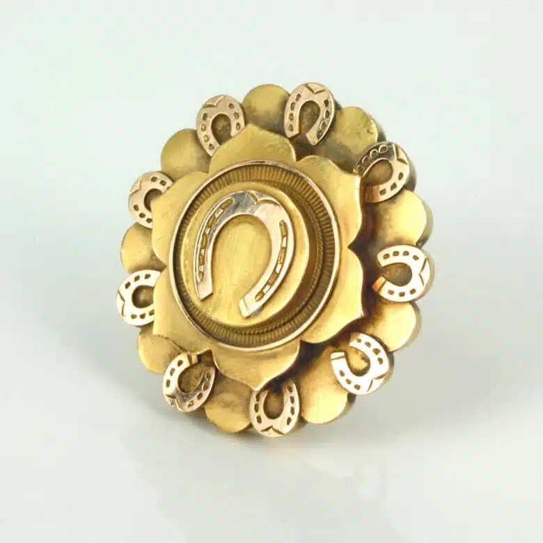Antique horseshoe brooch with locket