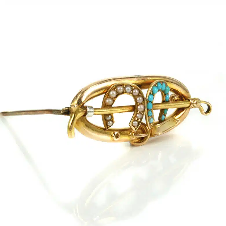 Antique turquoise and pearl horseshoe brooch