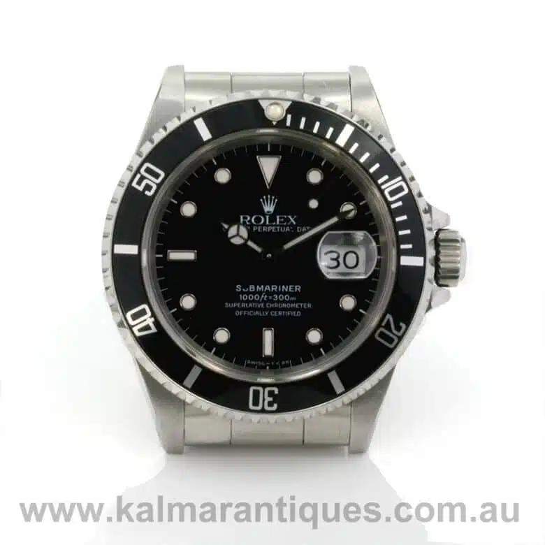Rolex Submariner model 16610 with box and papers
