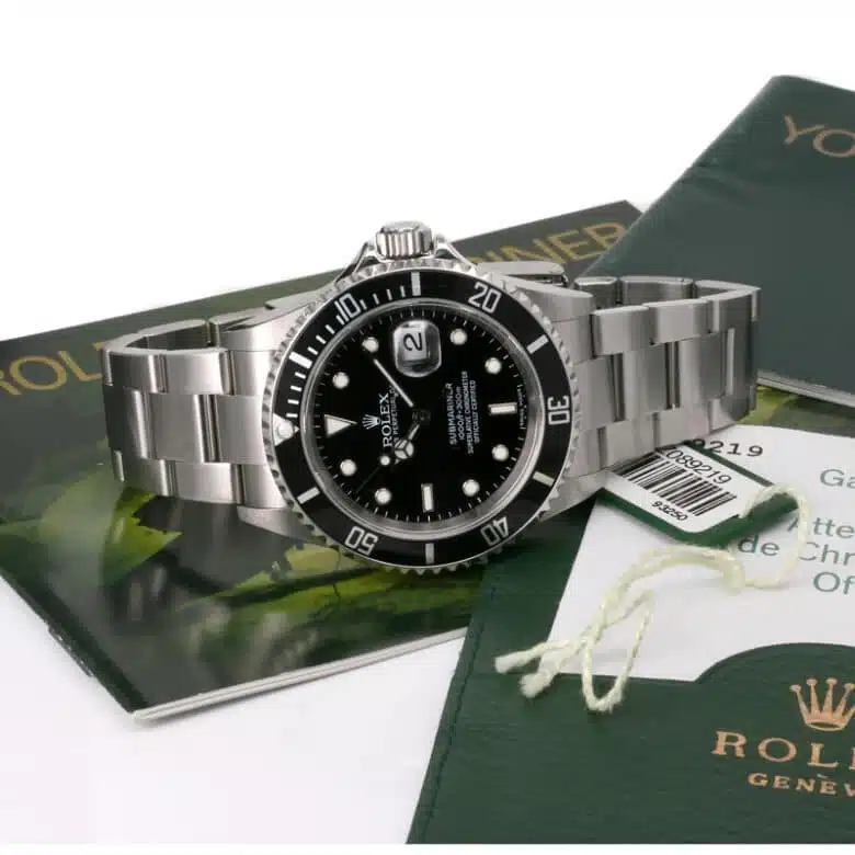 Rolex Submariner 16610 with box and papers.
