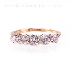 5 stone Art Deco diamond engagement ring