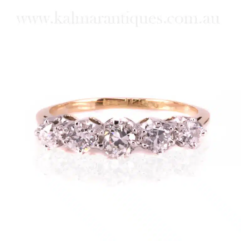 5 stone Art Deco diamond engagement ring