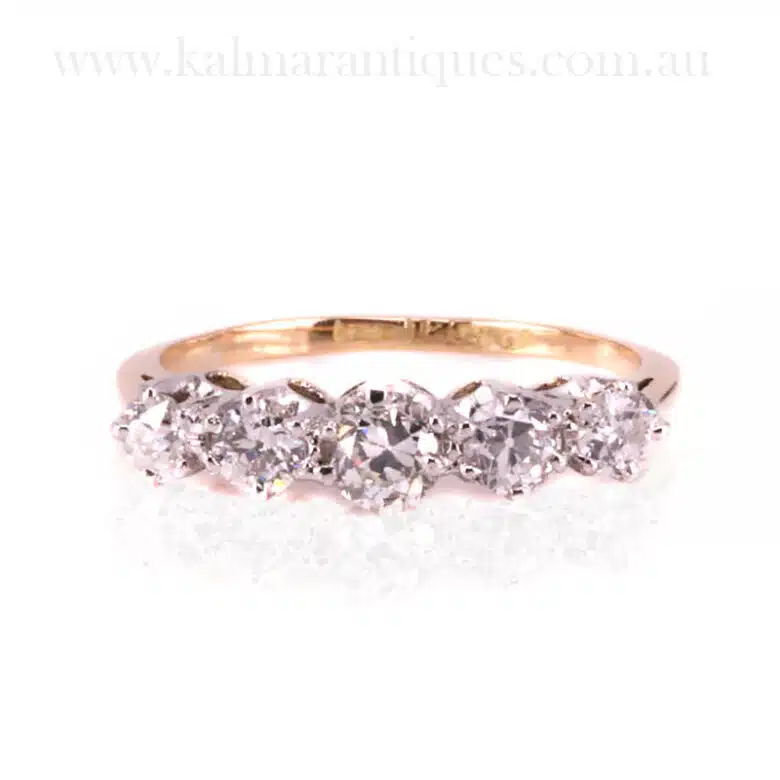 5 stone Art Deco diamond engagement ring