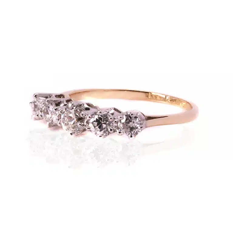 5 stone Art Deco diamond engagement ring