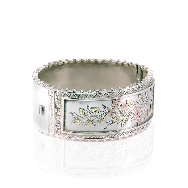 Antique silver and gold bangle