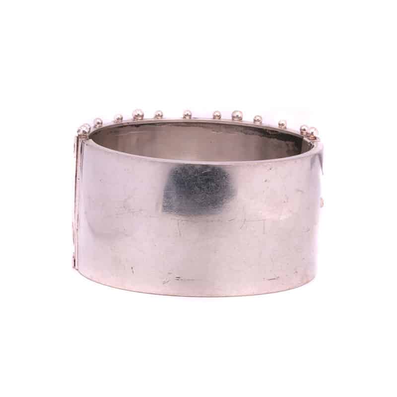 Wide antique silver bangle highlighted with rose gold