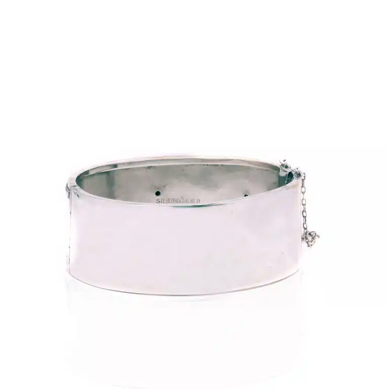 Victorian era antique bangle in sterling silver and highlighted with rose and green gold