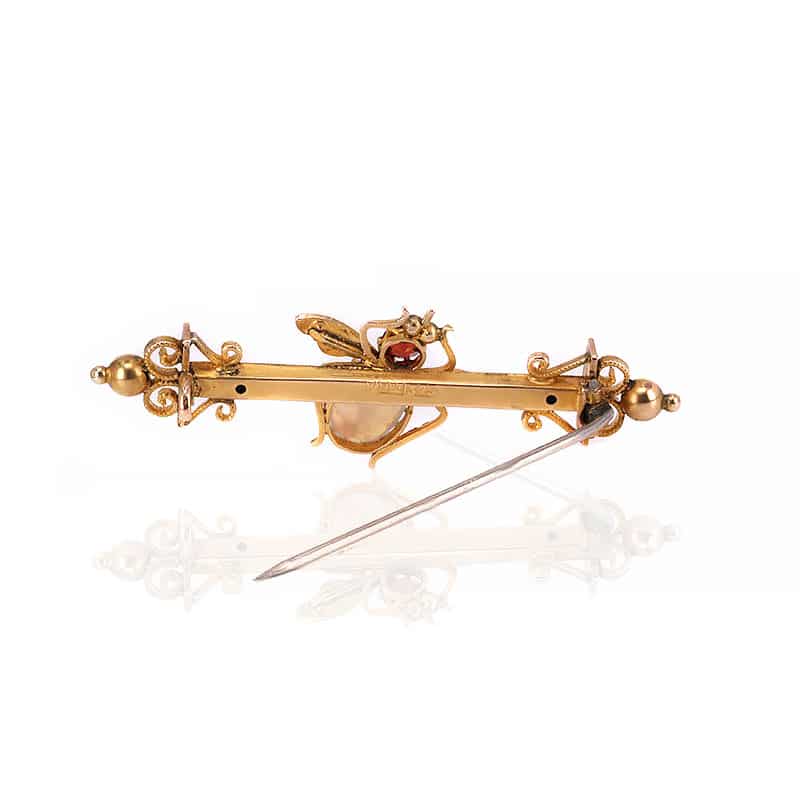 Antique fly brooch set with an opal, garnets and pearls