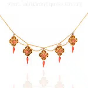 Exceptional antique coral necklace with lockets behind each one