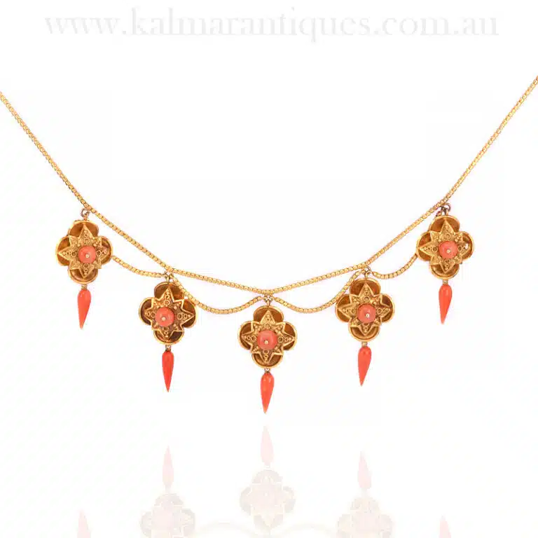 Exceptional antique coral necklace with lockets behind each one