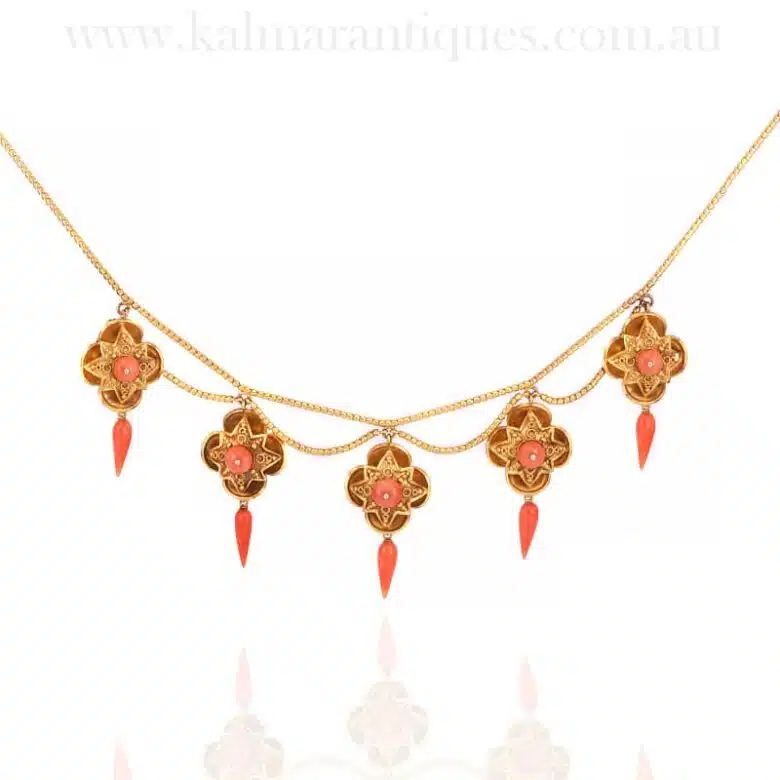 Exceptional antique coral necklace with lockets behind each one