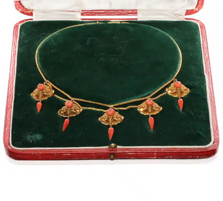 Exceptional antique coral necklace with lockets behind each one