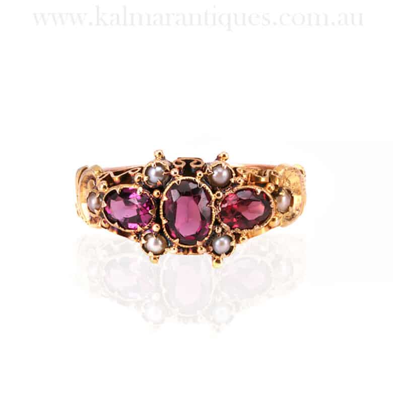 Antique Victorian era ring set with garnets and pearlsAntique Victorian era ring set with garnets and pearls