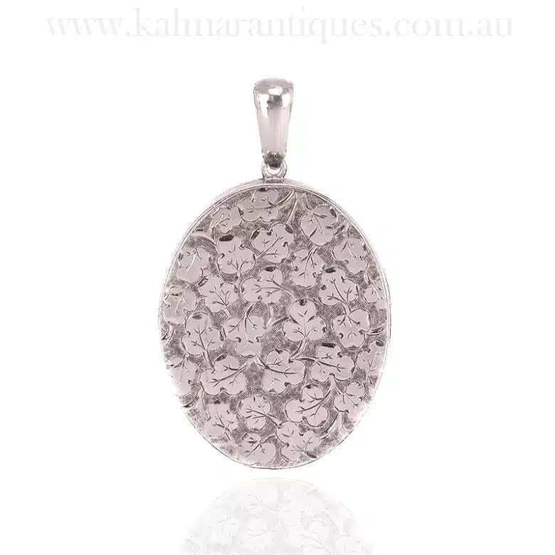 Hand engraved antique locket with ivies