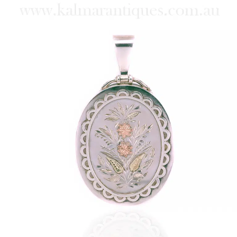 Victorian silver locket highlighted with rose and green gold