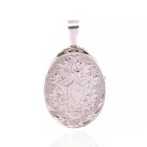 Victorian silver locket highlighted with rose and green gold