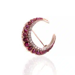 Antique ruby and diamond crescent brooch