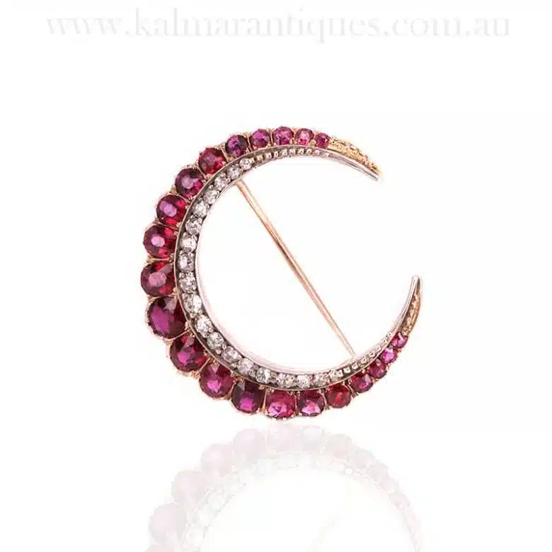 Antique ruby and diamond crescent brooch
