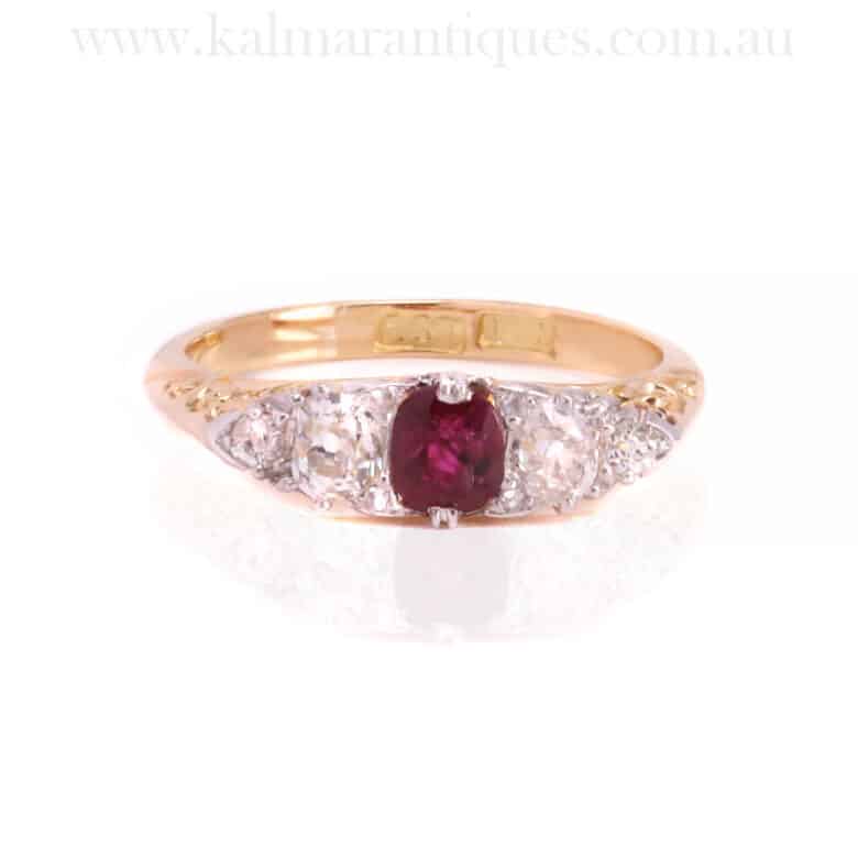 Antique ruby and diamond ring with scroll work sidesAntique ruby and diamond ring with scroll work sides