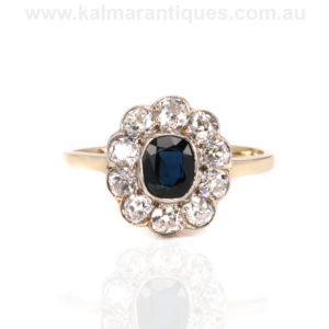 Art Deco sapphire and diamond cluster engagement ring