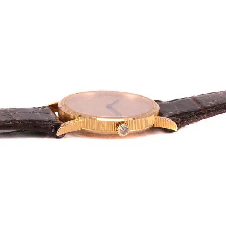 Corum gold coin watch