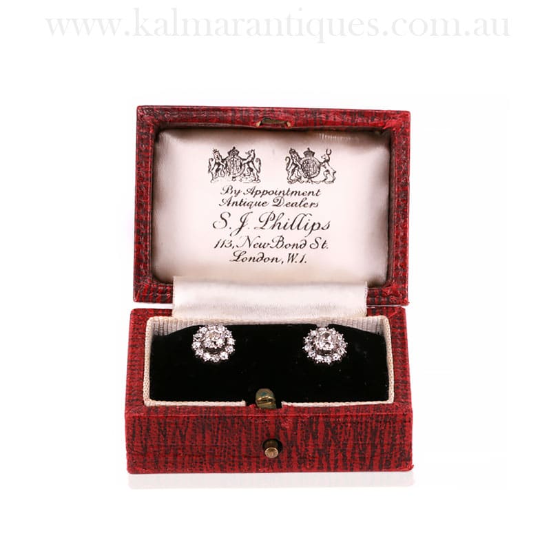 Antique diamond cluster earrings set with mine cut diamonds
