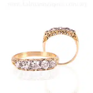 Antique Victorian era engagement ring with fleur-de-lis design