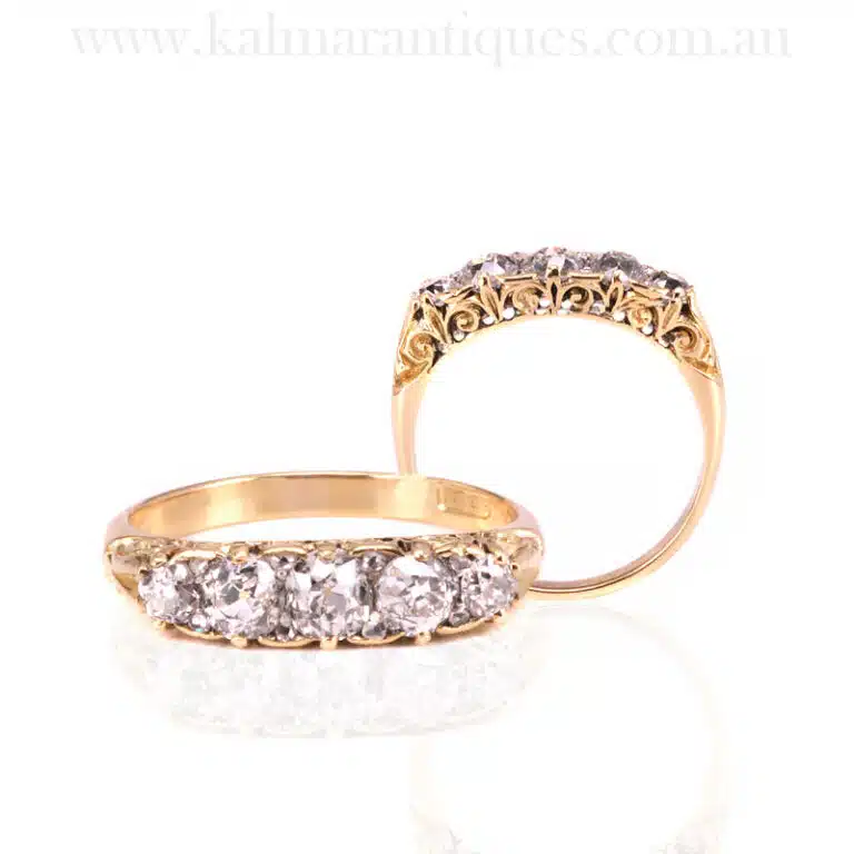 Antique Victorian era engagement ring with fleur-de-lis design
