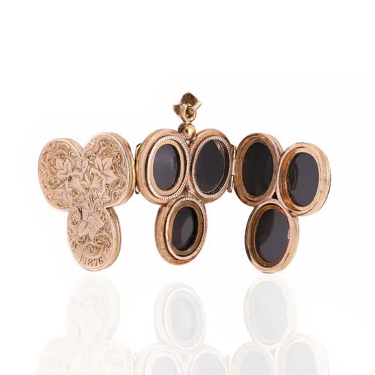 Rare family locket that can hold 12 photos