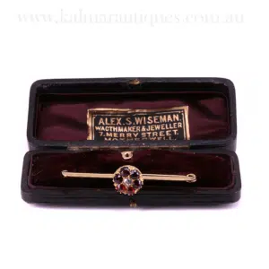 Garnet and diamond antique lapel pin and brooch