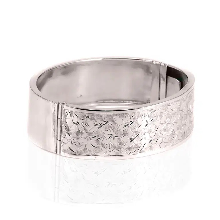 Antique sterling silver hinged bangle with ivy