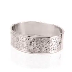 Antique sterling silver hinged bangle with ivy