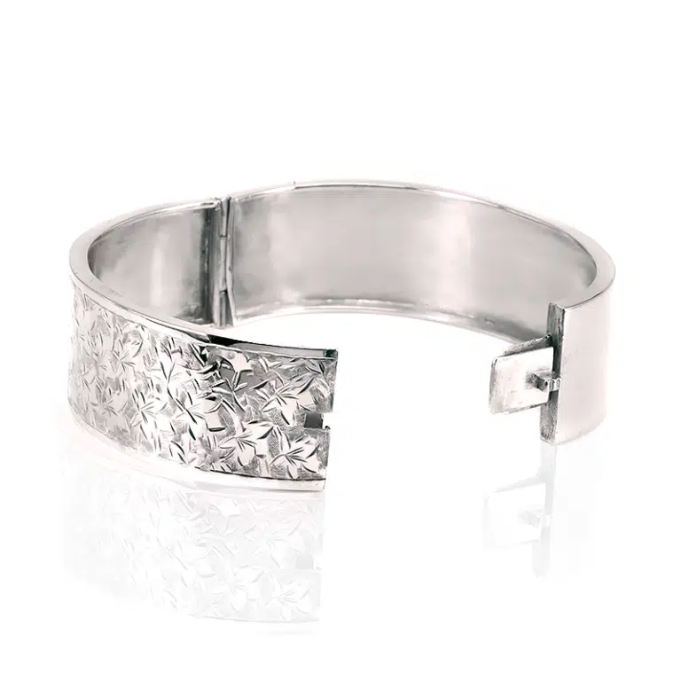 Antique sterling silver hinged bangle with ivy