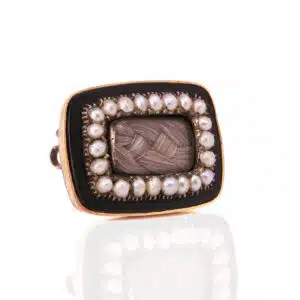 Antique enamel mourning brooch set with natural pearls
