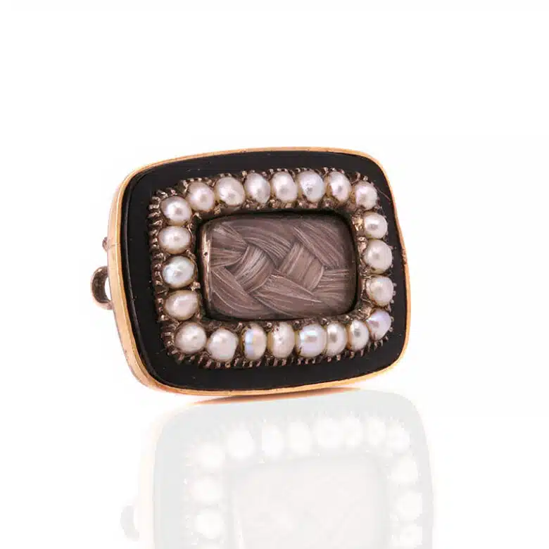 Antique enamel mourning brooch set with natural pearls