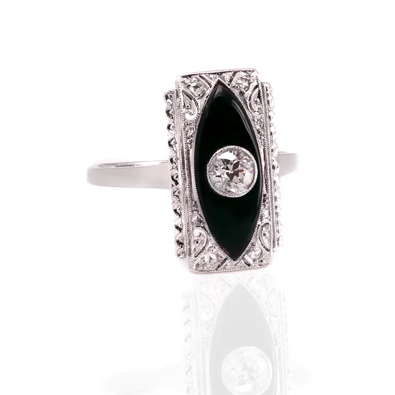 a ring with a onyx and diamonds