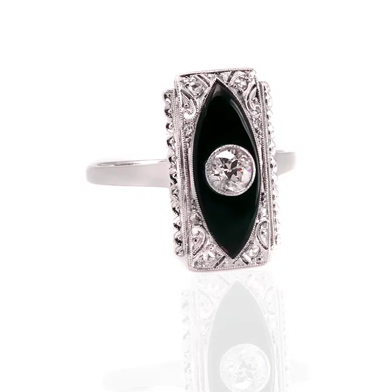 a ring with a onyx and diamonds