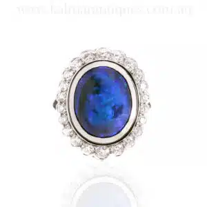 Lightning Ridge black opal and diamond cluster ring