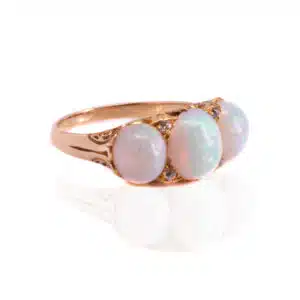 Antique solid opal and diamond ring